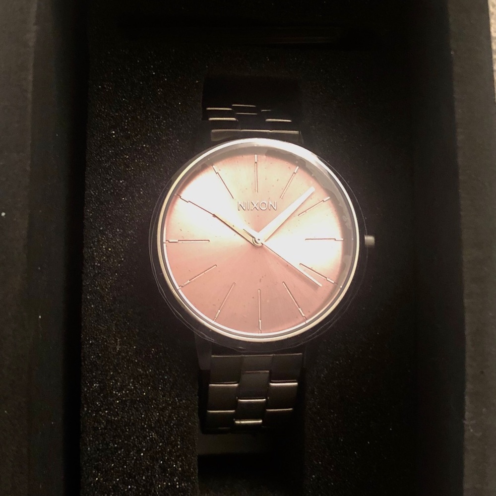 Nioxin silver and pale lavender watch